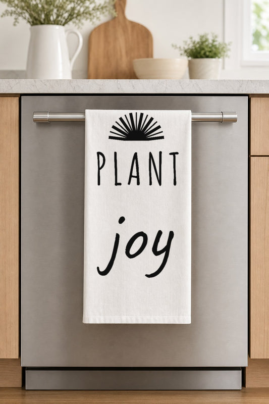 PLANT joy hand-lettered on a white cotton flour sack tea towel