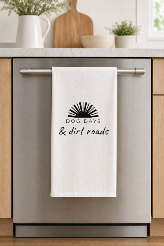 DOG DAYS & dirt roads hand-lettered on a white cotton flour sack tea towel