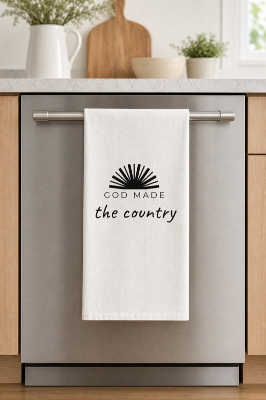 GOD MADE the country hand-lettered on a white cotton flour sack tea towel